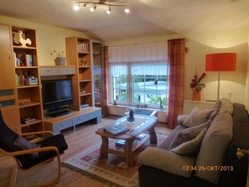 Koplietošanas atpūtas telpa ar TV, Ferienwohnung Ferien im Dorf in Bleckhausen