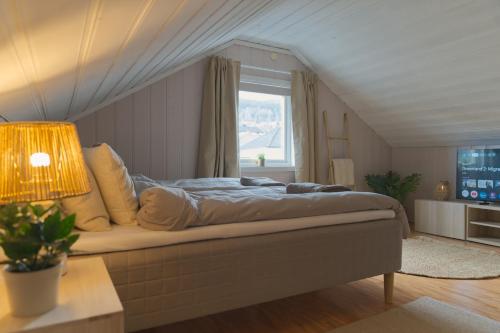 Cozy Nordic Attic with Smart TV & Modern Bathroom in Drammen