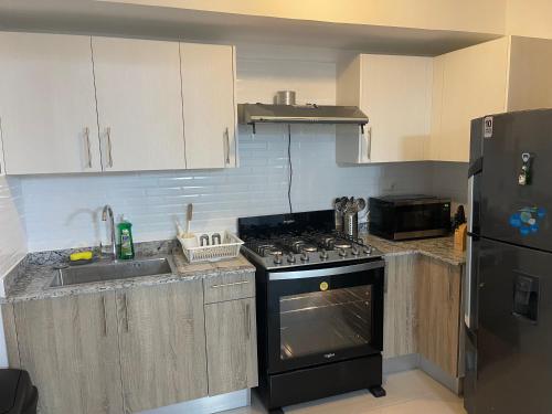 Lujoso apartamento con jacuzzi y gimnasio in Villa Mella