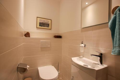 Two-Bedroom Apartment with balcony and mountain view (2 Adults and 2 Children)