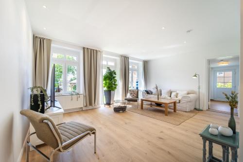 Koplietošanas atpūtas telpa ar TV, Wohlfühlen in Scharbeutz-Gleschendorf Komfort für 4 (Wohlfuhlen in Scharbeutz-Gleschendorf Komfort fur 4) in Ahrensbök
