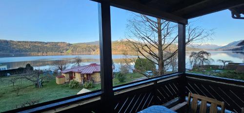 Erkély/terasz, Ferienwohnungen Fischerhaus - direkt am See in Millstatt