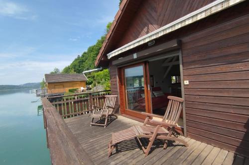 Rare petit chalet sur le lac barque à rames clim