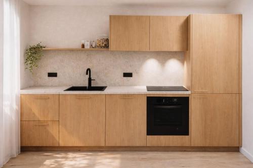 virtuve, Arriach Apartments in Ariaha