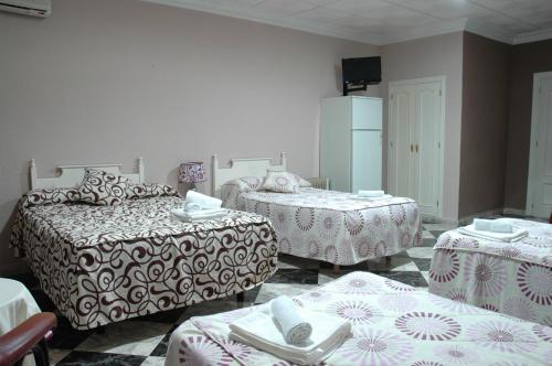 Hospedium Hotel Plaza Manjón Room Type - Quadruple Room
