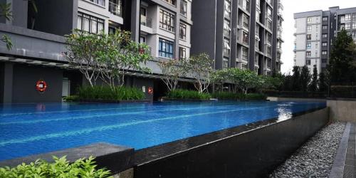 Swimming pool, HIJAU Geniehome 2BR 99mbps WIFI UtropolisShah Alam in Shah Alam