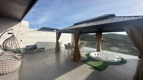 ทัศนียภาพ, Grape Resort منتجع وشاليهات عنب in อัญลูน
