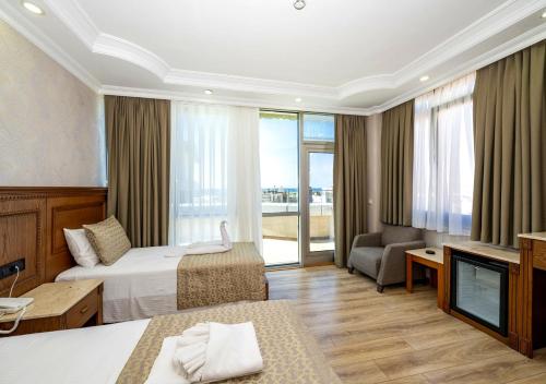 Dalan Hotel Room Type - Quadruple Room with Balcony
