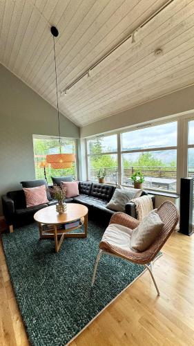 Modern mountain cabin offering breathtaking views and serene surroundings in Syssleback