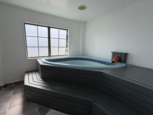 cadă fierbinte, Karaka Tree Motel in Taupo