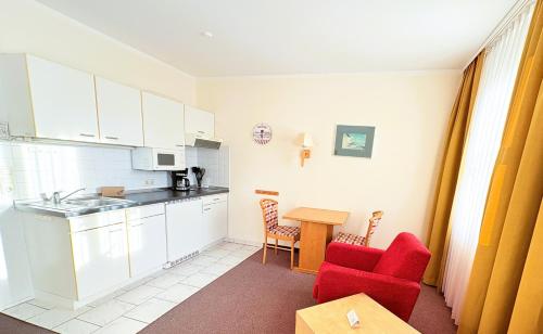 Fewo 8 im Haus Hühnergott Sellin - super für kleine Familien in Ostseebad Sellin, Deutschland