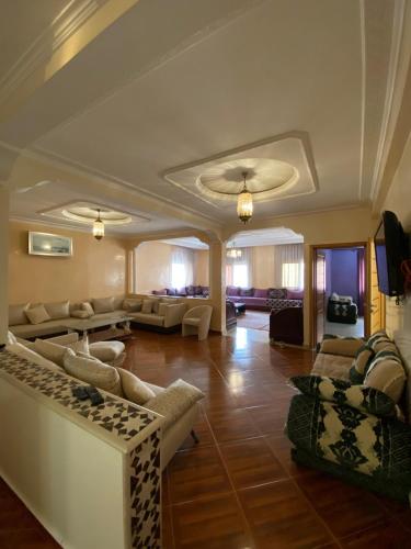 Spacious 3-Bedroom Apartment with Terrace & Free Parking at Hay El Houda in El Houda