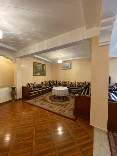 Spacious 3-Bedroom Apartment with Terrace & Free Parking at Hay El Houda in El Houda