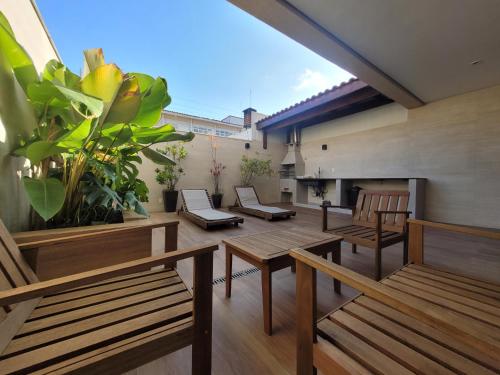 Casa sofisticada no Cond Ocean Place no Guarujá – khách sạn tại Vila Julia