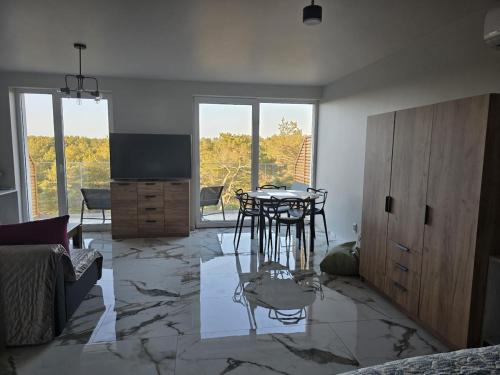 Apartament Sosnowy Las Widok na morze in Рови