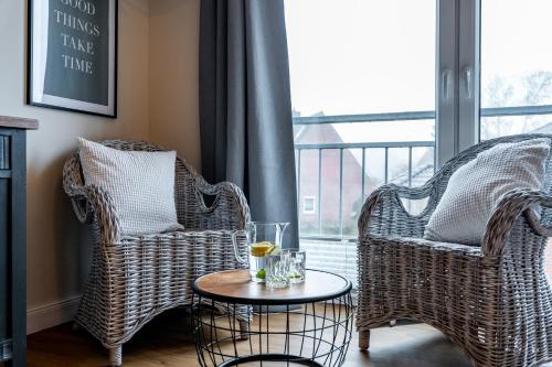 Küstenkojen mit 4 Ferienwohnungen für 1 bis 8 Pers mit diversen Schlafzimmern, Garten oder Balkon in Büsum, Deutschland