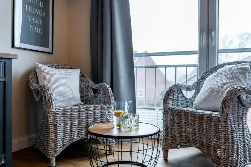 Küstenkojen mit 4 Ferienwohnungen für 1 bis 8 Pers mit diversen Schlafzimmern, Garten oder Balkon in Büsum, Deutschland