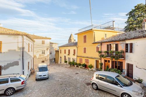 Residence with breathtaking views in the medieval village in Fratte Rosa