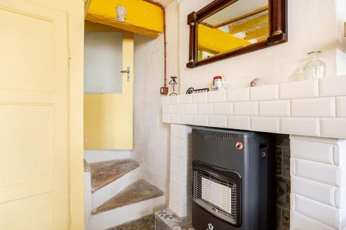 Residence with breathtaking views in the medieval village in Fratte Rosa