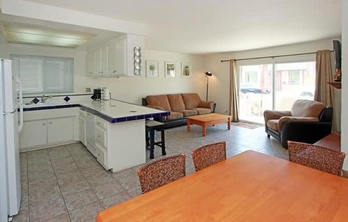 Location! Walk to beach grocery restaurants home - image 5