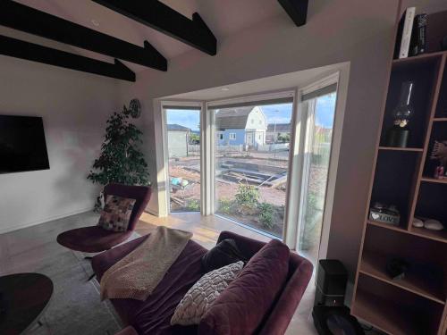 Child-friendly villa with outdoor lounge, close to beach & golf in Kallstorp