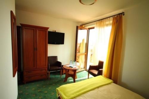 Triple Room with Balcony (2 Adults + 1 Child)