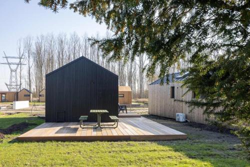 Tiny house with wooden deck in Oud Ade - Tuin van Keet - 30 in Leiderdorp