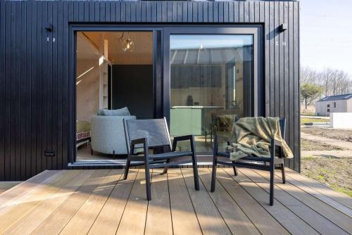 Tiny house with wooden deck in Oud Ade - Tuin van Keet - 30 in Leiderdorp