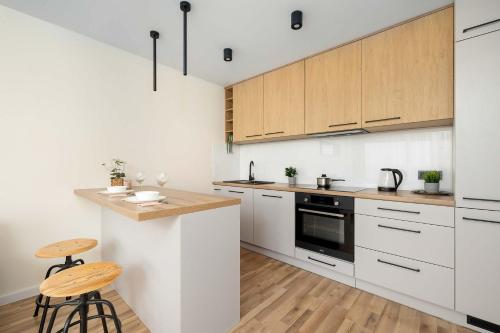 Przytulny Jasny Apartament z Balkonem by Noclegi Renters in 達布羅卡馬拉