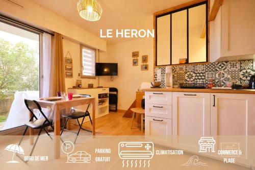 Le héron, plage à pieds