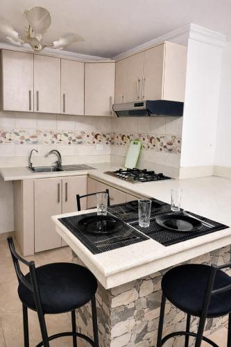 Nova Suite Moderna y acogedora en el centro GYE - image 3