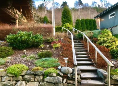 Exclusive log house with panoramic fjord views in Вангснес