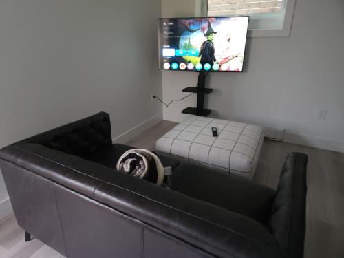 City View Condo in Vancouver Contemporary 1-Bedroom Suite – khách sạn tại Renfrew-Collingwood