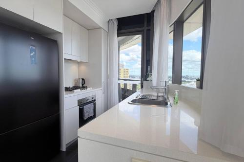Sky High 1BR apt in Sydney Olympic Park - main image