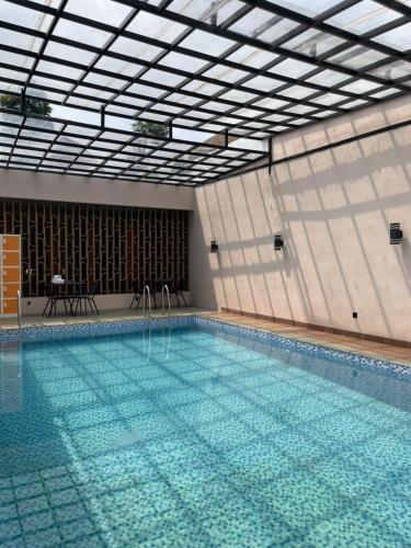 Swimming pool, Pakuhaji Highland Eco-Resort in Padalarang 2