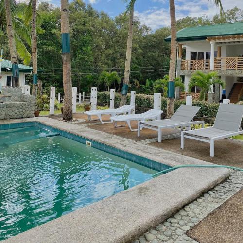 Swimming pool, Punta Private Beach Resort in Dulangan