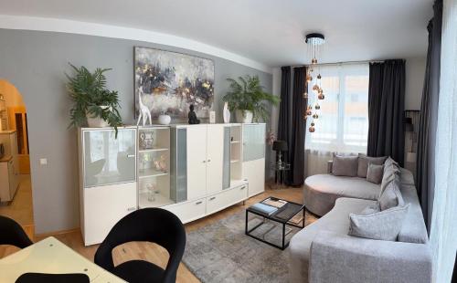Haus Schmidhuber Ferienwohnung 1 mit 2 Schlafzimmern und Terrasse