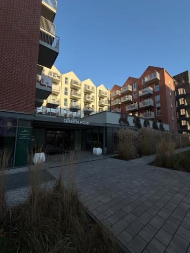 Green Port Apartamenty - basen, jacuzzi, sauna, silownia oraz bawialnia ZA DARMO - blisko morza, psi – khách sạn tại Podczele