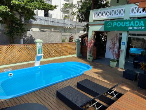 Swimming pool, Pousada Nosso Lar - Opte sem ou com Cafe, Estacionamento e a uma Quadra da Praia in Guaruja