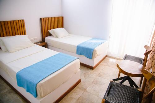 Hotel Palmas del Río Mompox (Hotel Palmas del Rio Mompox) in มองโปส