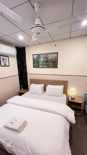 1 king bed, 1 futon bed