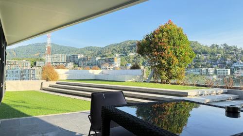 Balcony/terrace, 6th Avenue Surin by Win217 in Surin