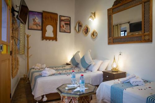 RiaD SHAUALA - FES LEGACY - image 6