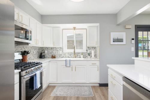 Swim and Relax with a Pool Hot Tub and Renovated HomeHop in Brooklyn (OH)