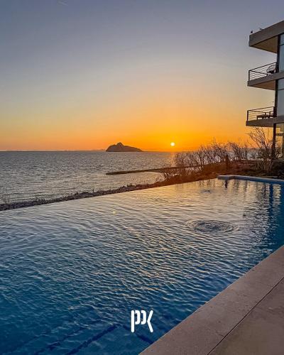 Peldbaseins, Kocoy Oceanfront condo in Punta Peninsula in Bahía Kino