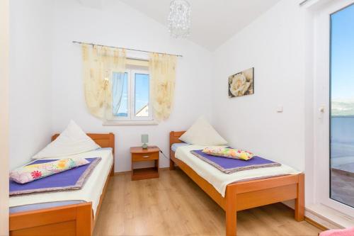 Apartments by the sea Trogir - 25303 - image 2