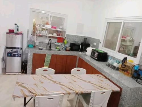Irene HOUSE in Nabua