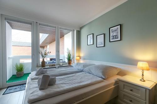 Top gelegene Ferienwohnung mit Balkon direkt im Zentrum von SPO in St. Peter-Ording, Deutschland