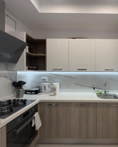 cuisine, Apartment with sea view and pool access in Chatt Mariem