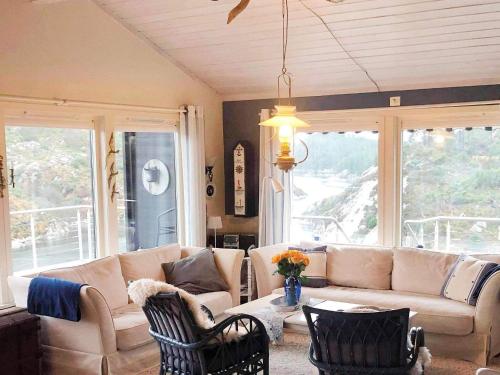 4 star holiday home in Urangsvåg (4 star holiday home in Urangsvag) in สตอร์ด